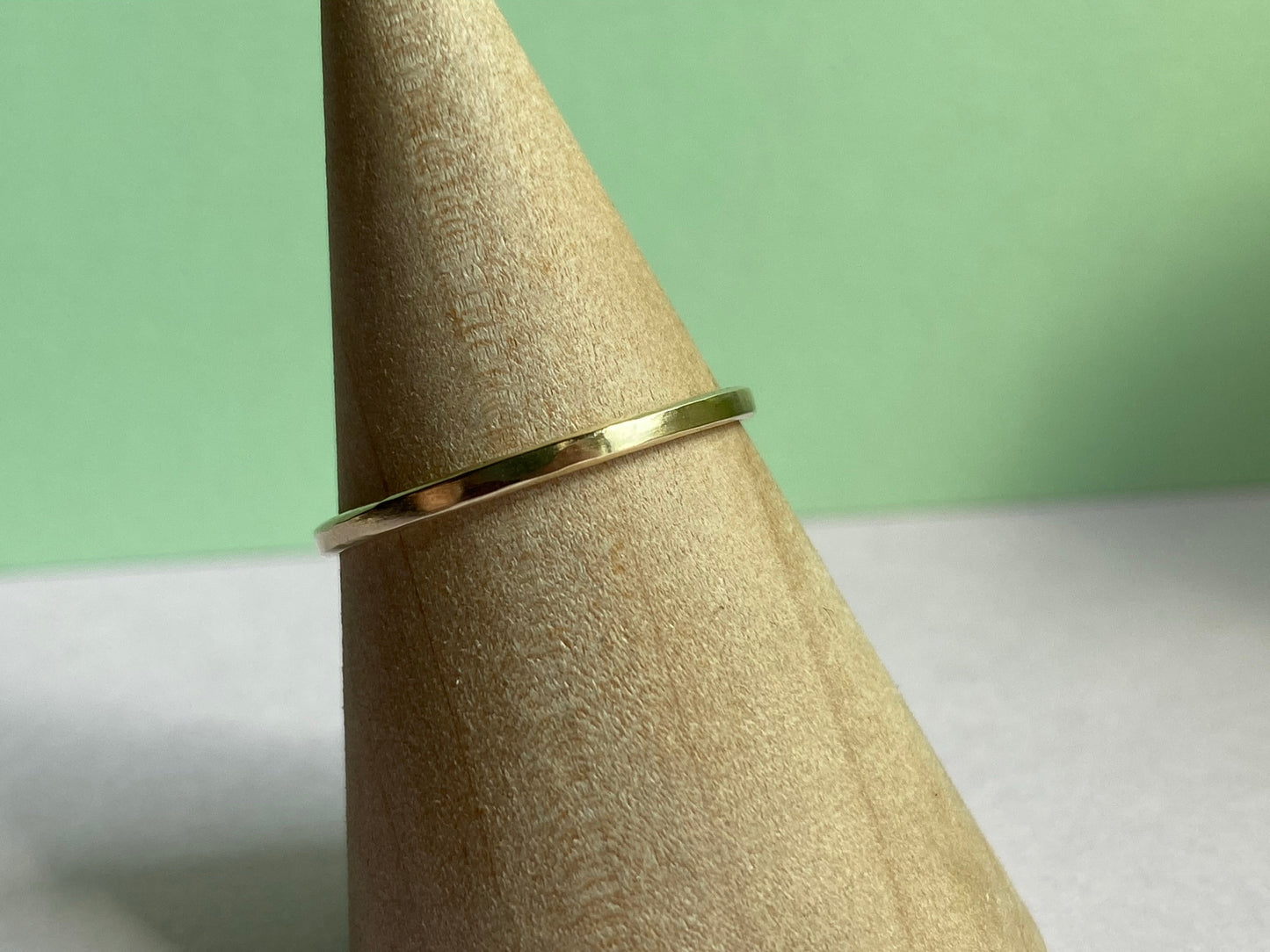 Solid 9ct yellow Gold smooth polished stacking ring band made from recycled gold. NM47