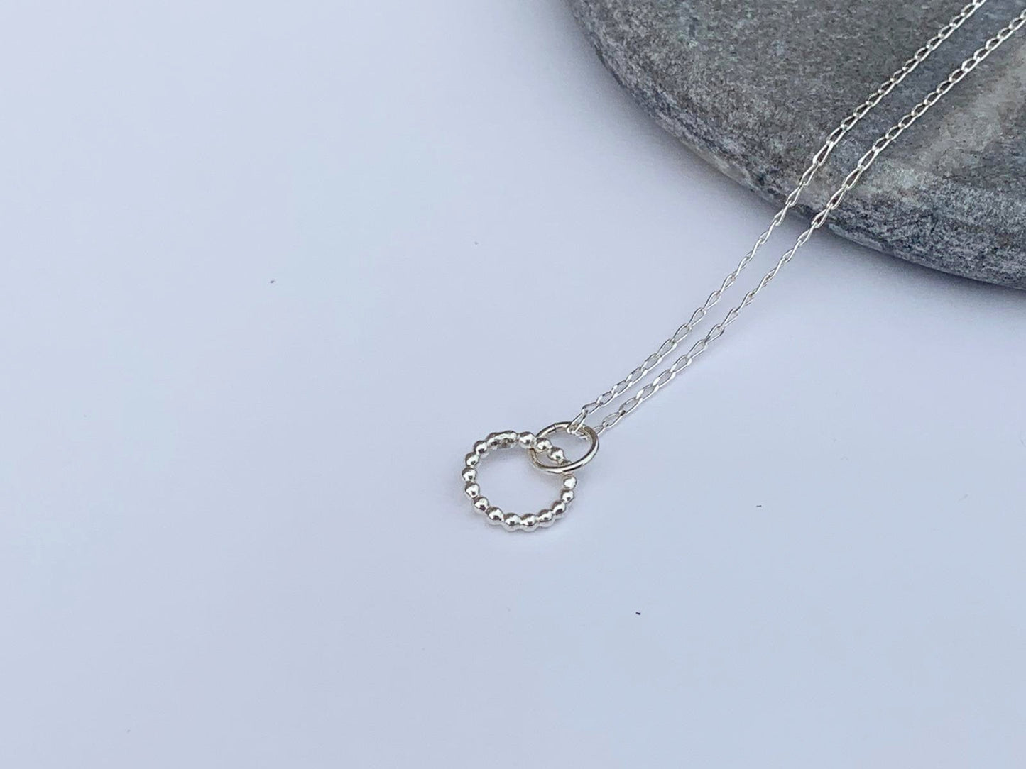 Sterling silver beaded hoop necklace