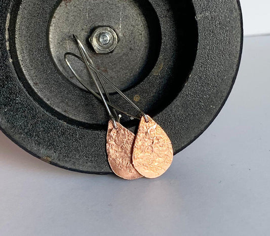 Silver earrings with reticulated copper drops