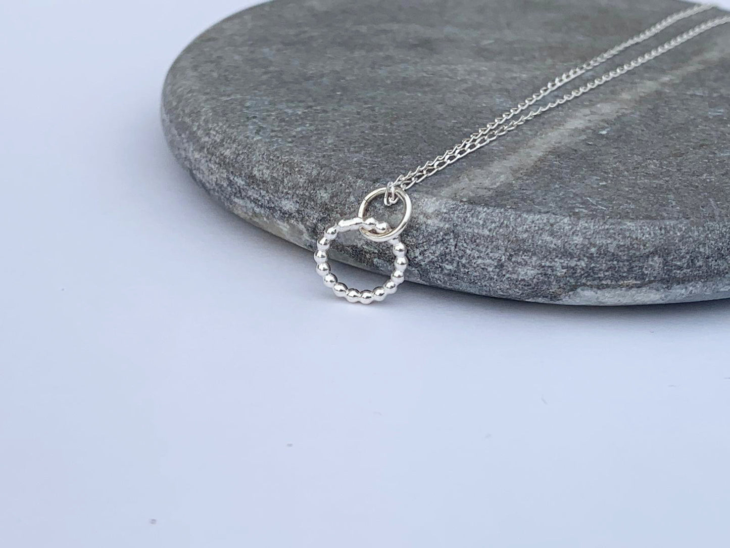 Sterling silver beaded hoop necklace