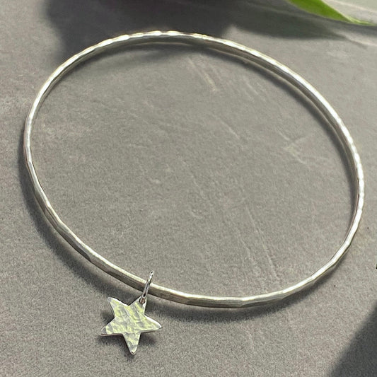Silver bangle with star charm NM47