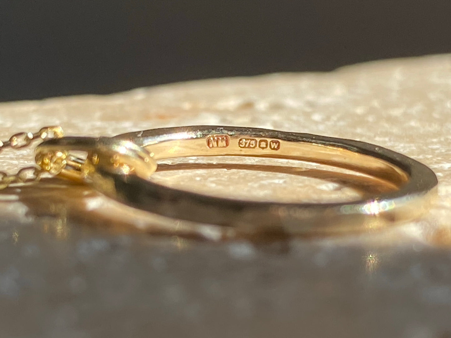 Solid 9ct yellow Gold hammered stacking ring band made from recycled gold.